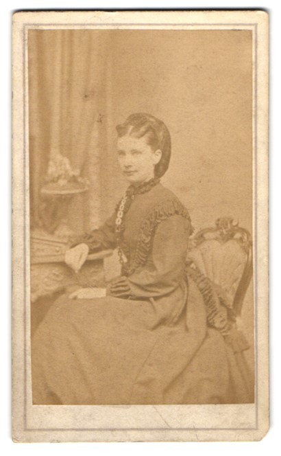 Photograph Lady in Elegant Dress Sitting on Chair
