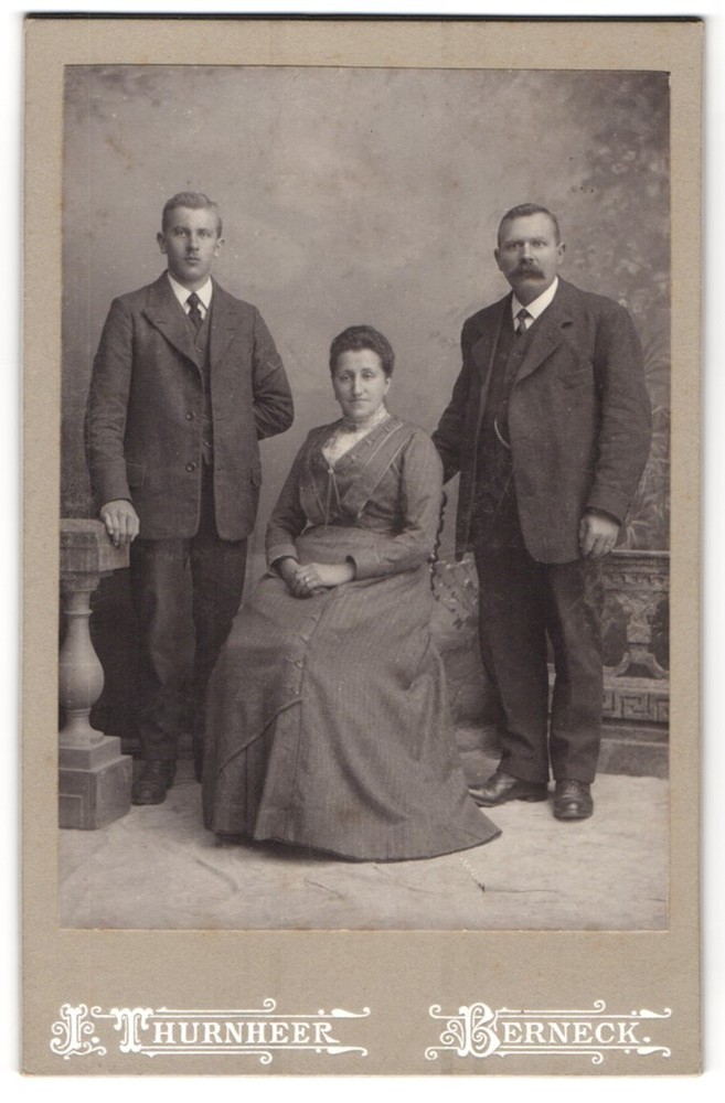 Photography studio Thurnheer, Berneck, three people in festive clothes