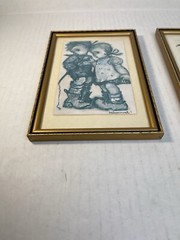 (2) Hummel characters photo prints in case in a 7 1/2” H x 5 1/4” W frame