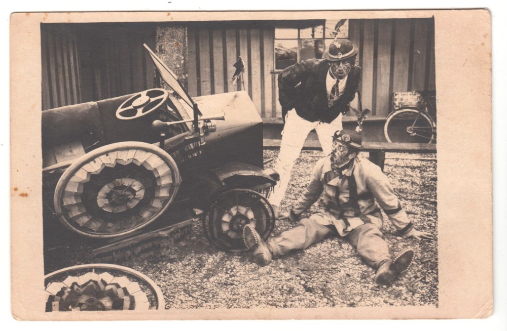 Circus clowns at parody or sketch with car circus artists with car RPPC ~1910