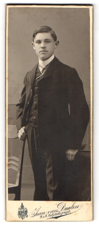Photograph Jean van Daalen, Aalen, Bahnhofstrasse, boy in elegant suit with