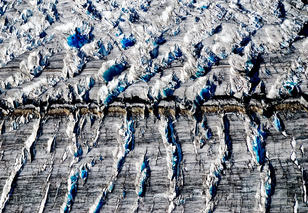 Neil Reichline Photo, “Ice Melt on Alaskan Glacier” aerial
