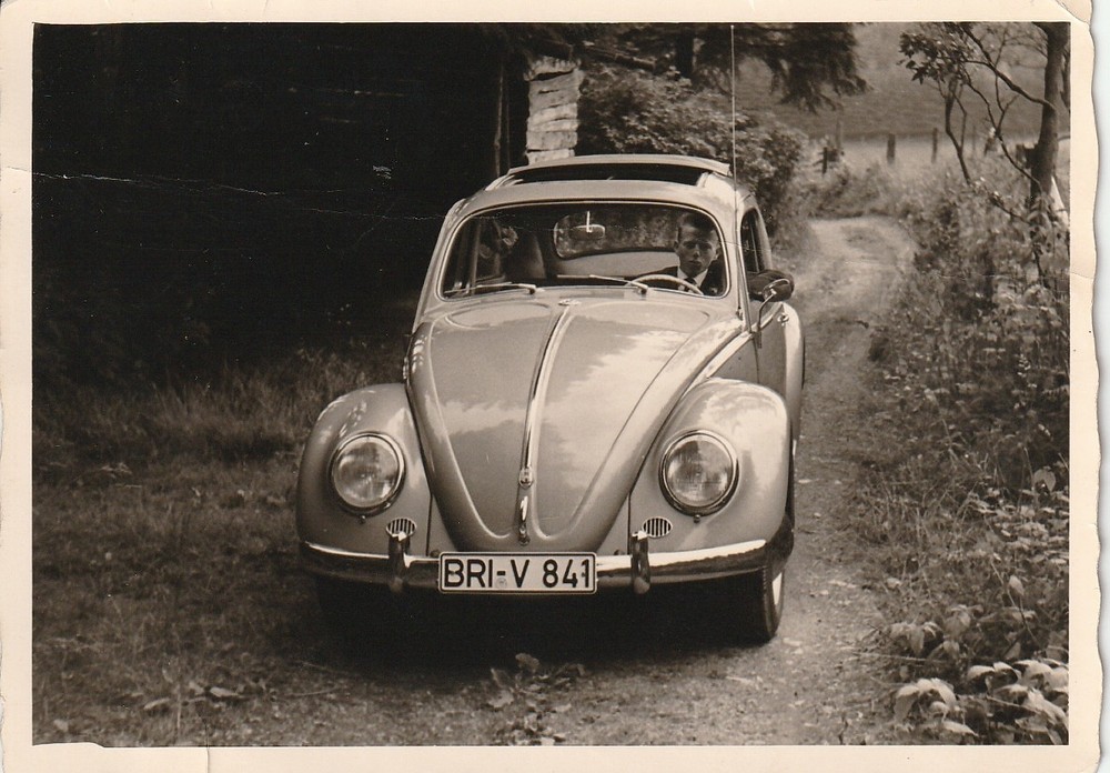 Vintage Photo Man in 1950s VW Beetle with Sunroof Car Vintage Passenger Car