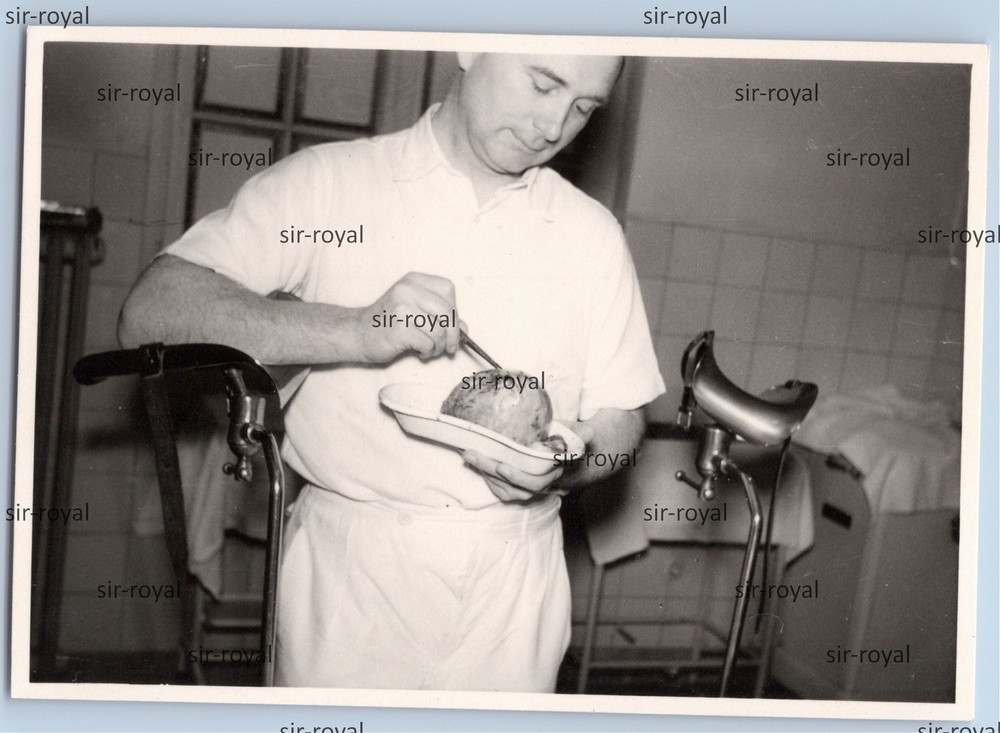 Doctor Poking With Tweezers In Tumor? in kidney dish in hospital photo 10x7cm