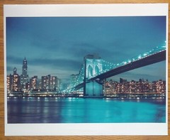 Vintage Photograph Of The Brooklyn Bridge And NYC Skyline At Night