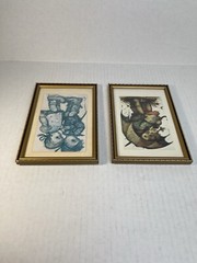 (2) Hummel characters photo prints in case in a 7 1/2” H x 5 1/4” W frame