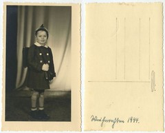 33916 – Little Schoolboy with Satchel in Photo Studio – Dated Christmas 1944
