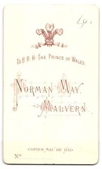 Photograph Norman May, Malvern, Boy in Suit with Arms Crossed