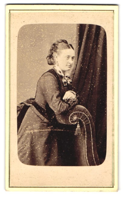 Photograph Lady in Elegant Dress Leaning Against Ornate Chair