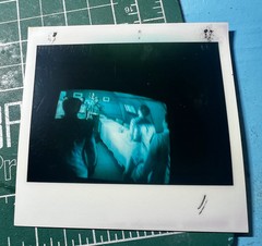 Picture Polaroid of distorted Blue TV like from a Horror Movie 1980