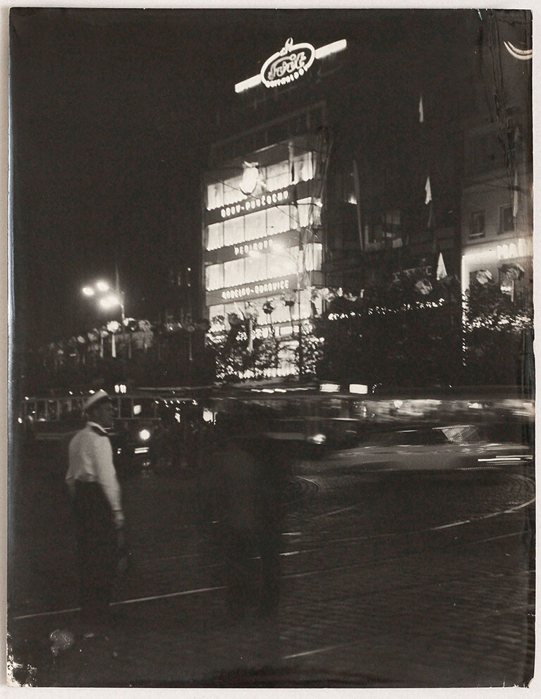 Oversized vintage 1960s night view, street, Czech town, neon lights, art photo