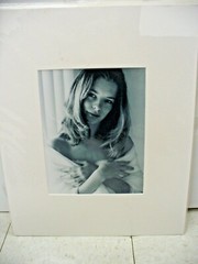 MATTED PHOTOGRAPHY Woman by Window Wrapped in Blanket Black and White 16×20