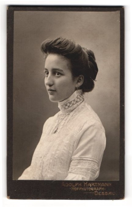 Photography Adolph Hartmann, Dessau, young lady in lace dress with updo