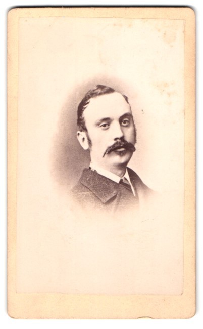 Photograph A Portrait Of A Man With Moustache