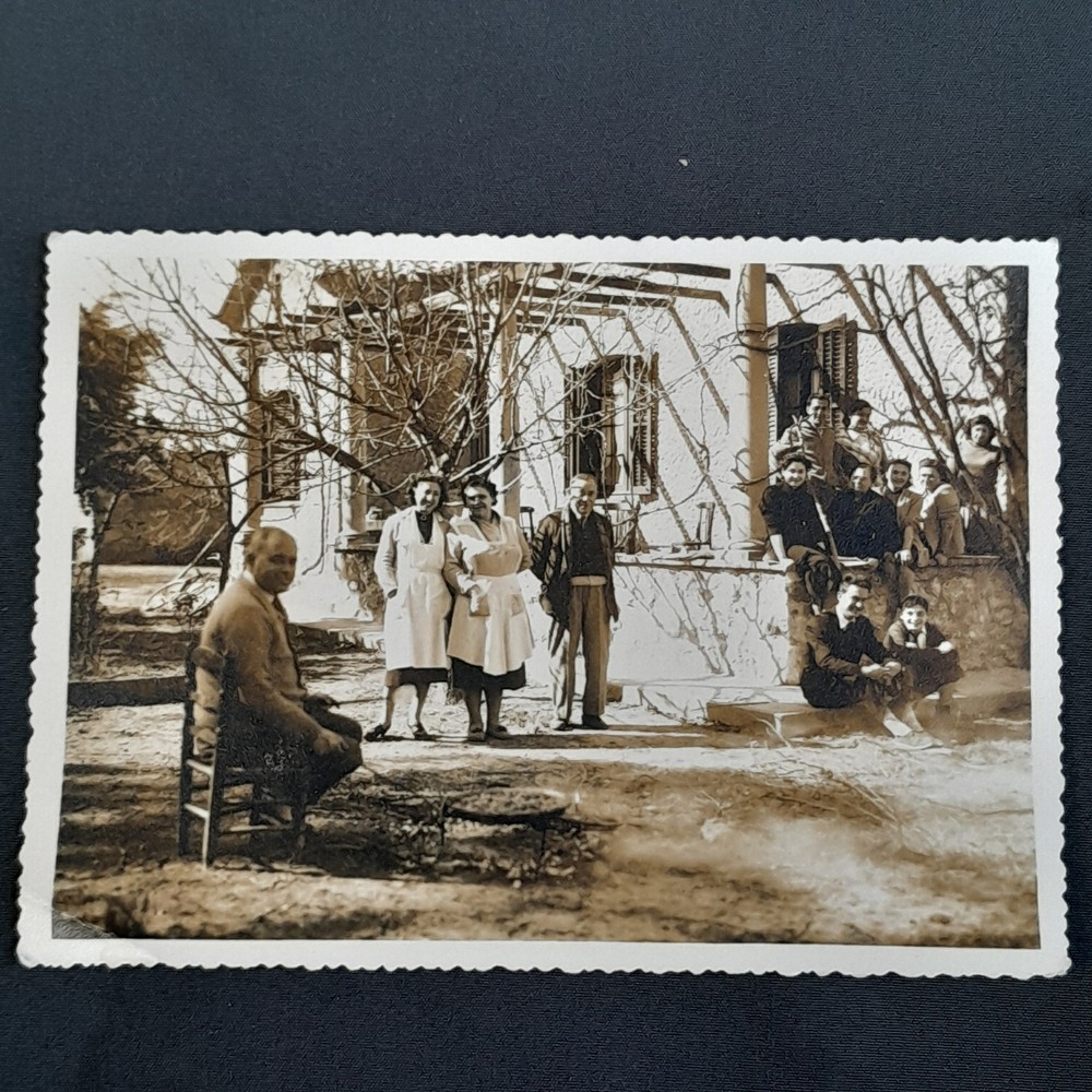 F-5896. Family Portrait Photograph In The Garden Of A House. 1954.