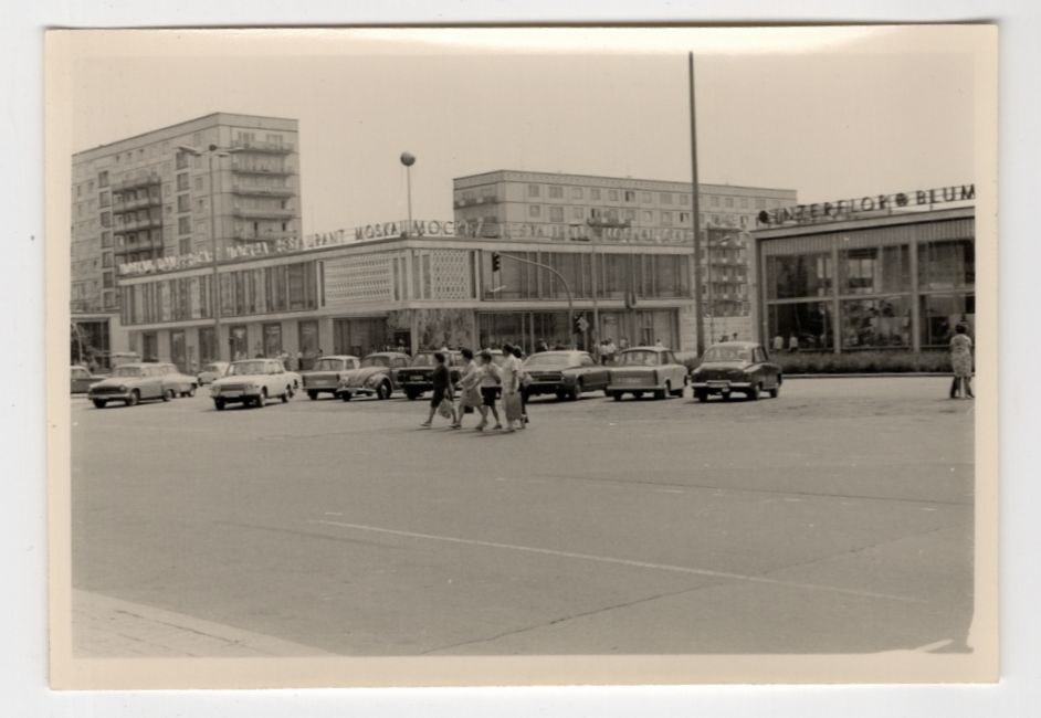 Photo East Berlin Moscow restaurant parking cars GDR architecture