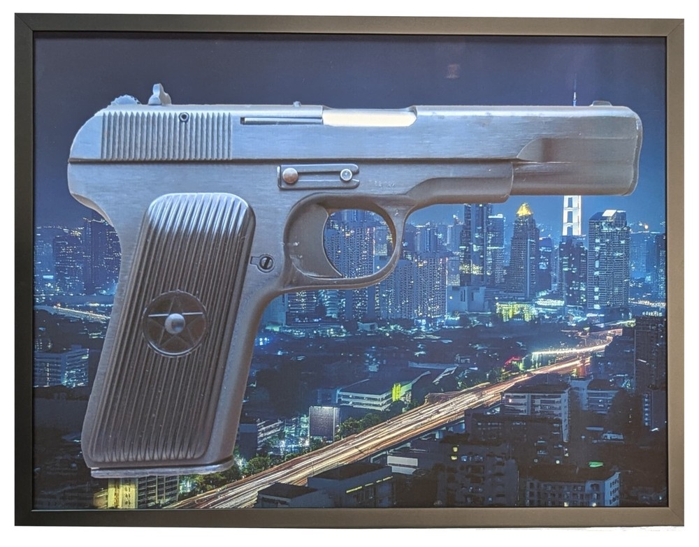 Framed TT Style Hand Gun with Night City background