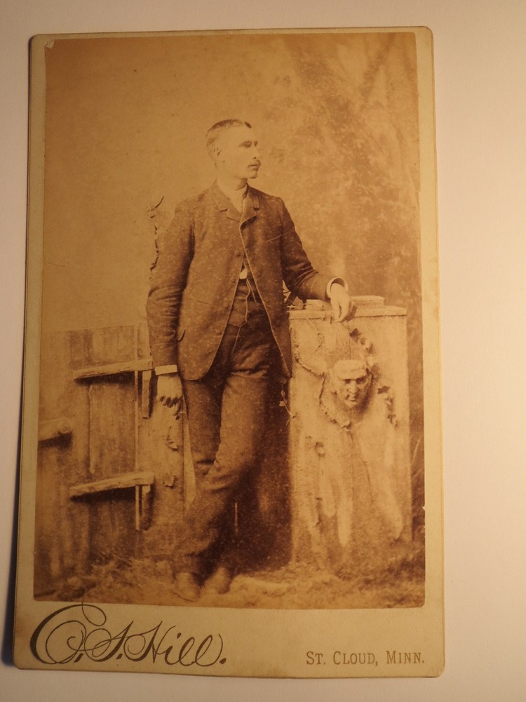 St. Cloud Minnesota USA – Standing Man in Suit – Backdrop / KAB