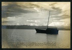 Sail boat at sunset antique art photo