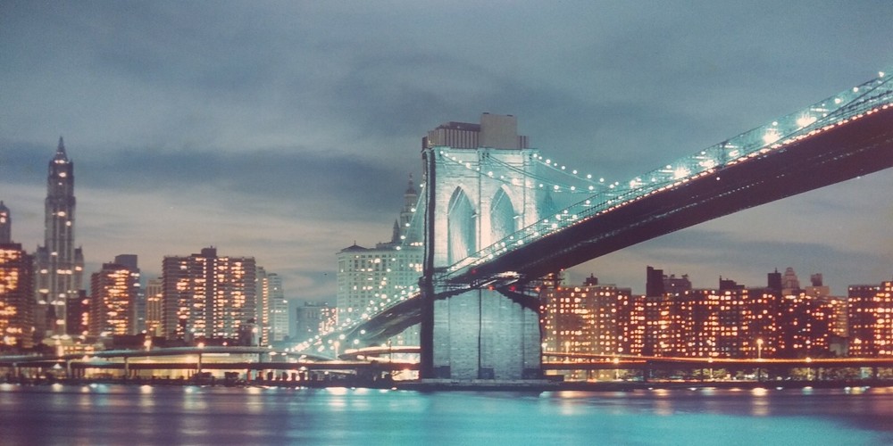 Vintage Photograph Of The Brooklyn Bridge And NYC Skyline At Night