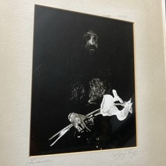 Lawanda Black And White Photography Of Man Holding White Flowers By Gypsy Ray