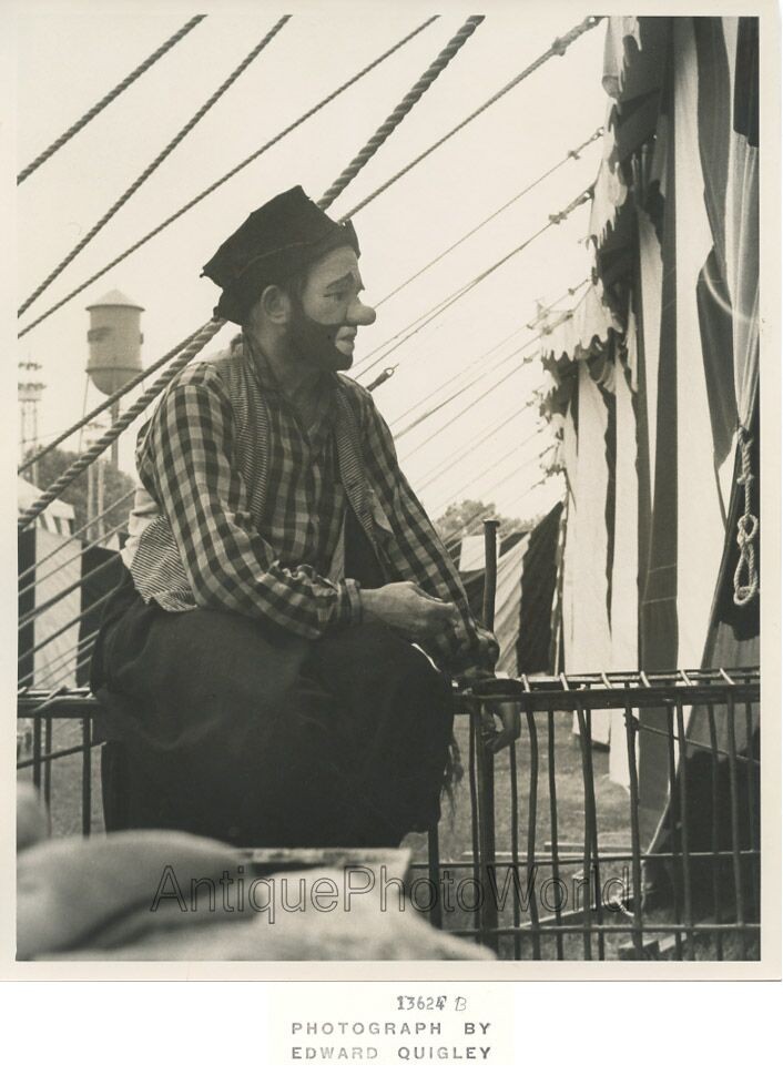 Sad clown by cage vintage circus art photo by Edward Quigley