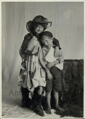 Barefoot children dressed as hobos antique photo